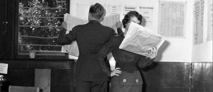Image of a man and woman in a newspaper office. Image courtesy of the UNT Special Collections.
