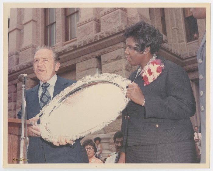 Barbara Jordan holding an award